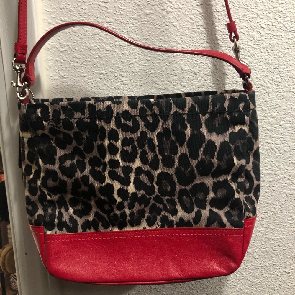 Coach ocelot and red leather purse, leopard